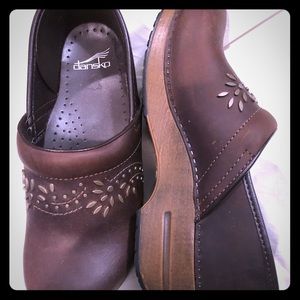 New without box Dansko Clogs. Never worn.